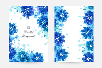 Romantic background with blue cornflowers and paint splashes.