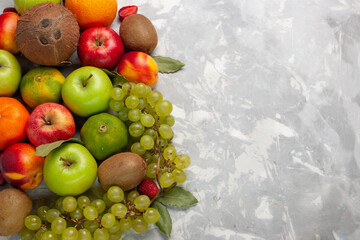 top view different fruit composition fresh fruits on the white desk fruit fresh mellow summer color