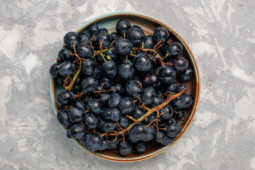top view fresh black grapes juicy mellow sweet fruits on light-white desk fruit fresh mellow juice wine