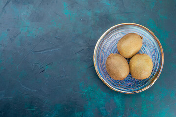 top view fresh kiwis sour fruits inside plate on the dark background tropical exotic sour fresh mellow