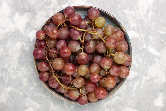 top view fresh red grapes juicy mellow sweet fruits on white desk fruit fresh mellow juice wine