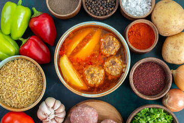 top view fresh vegetables with seasonings meat soup and greens on dark-blue background vegetable food meal dish