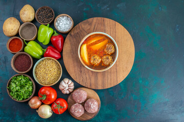 top view fresh vegetables with seasonings meat soup and greens on dark-blue background vegetables food meal dish