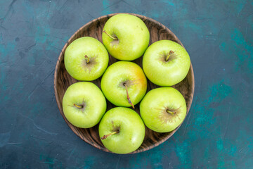 top view green apples fresh mellow fruits on the dark blue desk fruits fresh plant tree mellow