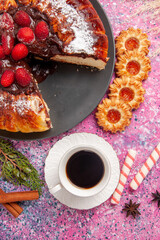top view strawberry chocolate cake with sweet cookies and cup of tea on the pink background sugar sweet biscuit cookies