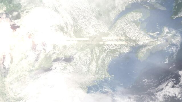 Earth zoom in from outer space to city. Zooming on Plattsburgh, New York, USA. The animation continues by zoom out through clouds and atmosphere into space. Images from NASA