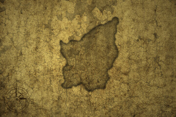 map of san marino on a old vintage crack paper background .