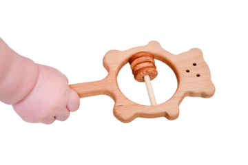 Baby hand and toy rattle abacus, close-up, isolated on a white background. Children fingers and an object on a white background