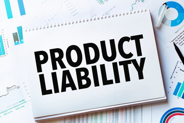 Notebook with Tools and Notes with text product liability