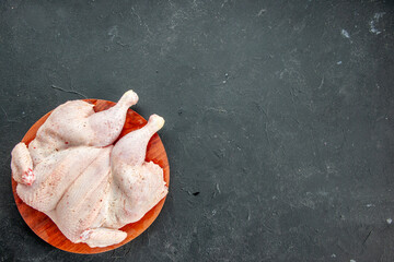 top view fresh raw chicken on dark background cooking dish food salad barbecue color dinner bird free space
