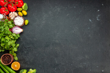 top view fresh red tomatoes with greens and seasonings on dark background salad ripe health diet food meal color free space