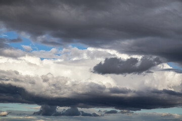 Naklejka na ściany i meble Epic Storm clouds, sky, blue dark clouds background texture, thunderstorm