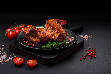 Delicious fried sea bass fish in the form of slices with spices and herbs