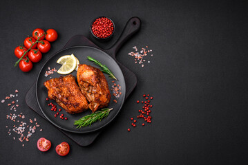 Delicious fried sea bass fish in the form of slices with spices and herbs