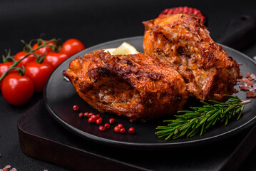Delicious fried sea bass fish in the form of slices with spices and herbs