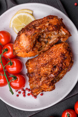 Delicious fried sea bass fish in the form of slices with spices and herbs