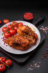 Delicious fried sea bass fish in the form of slices with spices and herbs