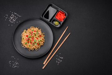 Delicious fresh Asian noodles with vegetables, salt, spices and herbs