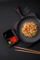 Delicious fresh Asian noodles with vegetables, salt, spices and herbs