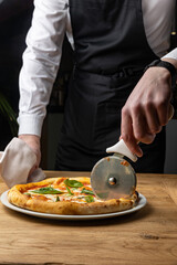 delicious italian pizza on a wooden table
