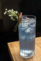 Alcoholic drinks on an old wooden table close up. 