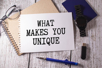 The question What Makes You Unique typed on a piece of lined paper