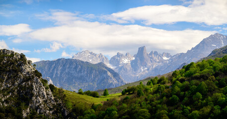 Fototapeta premium View on Naranjo de Bulnes or Picu Urriellu, limestone peak dating from Paleozoic Era, located in Macizo Central region of Picos de Europa, mountain range in Asturias, Spain