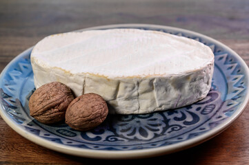 French white mold soft cow milk cheese Caprice des Dieux from Haute-Marne region, France