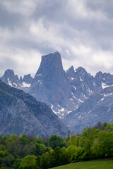 Obraz premium View on Naranjo de Bulnes or Picu Urriellu, limestone peak dating from Paleozoic Era, located in Macizo Central region of Picos de Europa, mountain range in Asturias, Spain