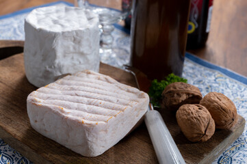 Cheese collection, Belgian soft yellow cow milk cheese with white mold from Bruges and bouquet des moines from Abbey of Val-Dieu