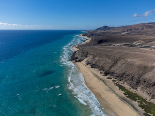 Fototapeta na wymiar Aerial view on sandy dunes and turquoise water of Sotavento beach, Costa Calma, Fuerteventura, Canary islands, Spain