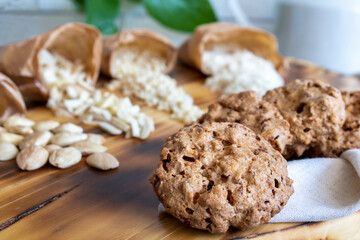 Caprichos de Santiago. Almond cookies. Craft paper packets with whole raw almonds