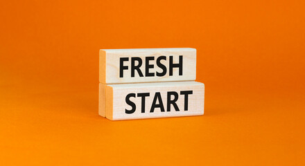 Fresh start and motivational symbol. Concept words Fresh start on beautiful wooden block. Beautiful...
