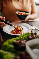 Churrasco - Barbecue Rodizio - Serving vinaigrette, rice, farofa and skewers