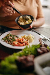 Churrasco - Barbecue Rodizio - Serving vinaigrette, rice, farofa and skewers
