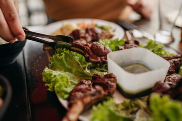 Churrasco - Barbecue Rodizio - Serving vinaigrette, rice, farofa and skewers