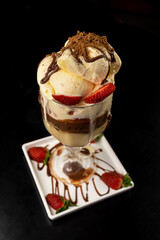 Dessert - Cup with brownie with milk chocolate and cream ice cream