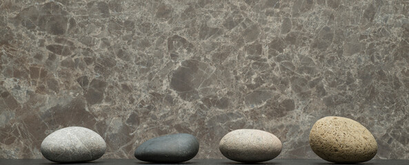 Fototapeta na wymiar gray zen stones on a dark gray background with shadows for a podium background.a group of oval stones for product presentation