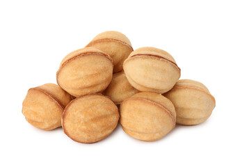 Fototapeta premium Delicious nut shaped cookies with condensed milk on white background
