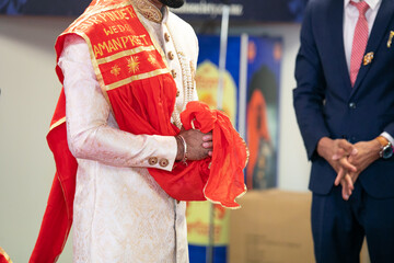 Indian Punjabi wedding ceremony bride and groom's hands close up