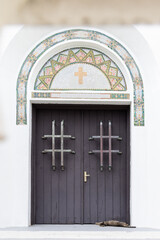 Old San Juan: a cat chilling in front of a church