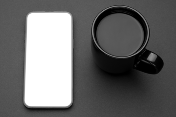 Mockup display. Mobile cell phone blank screen. Smartphone technology. Office workplace with cup of tea or coffee. Smart phone. Mock up device for application, website design project. Dark Background