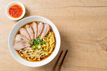 egg noodles with stewed duck in brown soup
