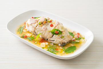 steamed sea bass fish with herbs