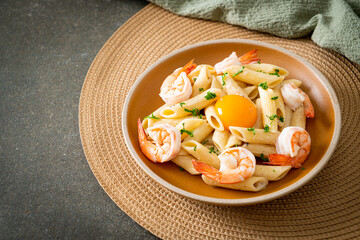 penne pasta white cream sauce with shrimps and egg