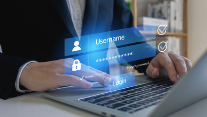 Businessman use laptop login register username and password identity on virtual screen of cyber security, data protection and secured internet access, cybersecurity.