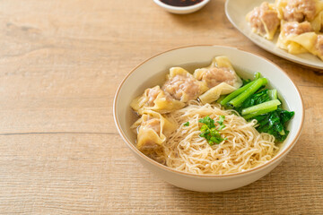 egg noodles with pork wonton soup or pork dumplings soup and vegetable