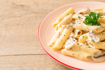 penne pasta carbonara cream sauce with mushroom