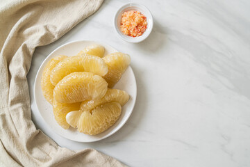 Fresh peeled pomelo, grapefruit or shaddock