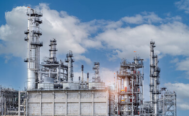 Industry Overview The refinery is an industrial area with sunrise and cloudy skies, oil and natural gas storage tanks, the refinery industry.